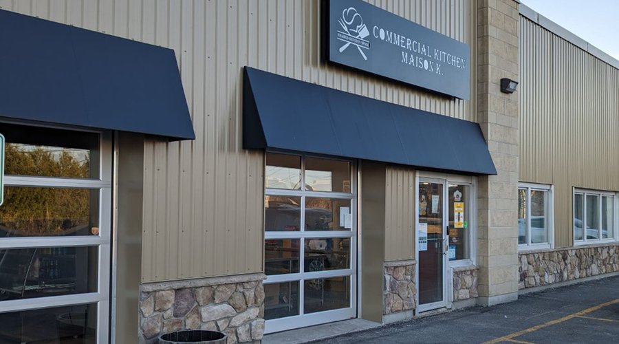 3/4 View of building where the Vietnamese sandwich take-out kitchen is located in a strip mall.  My wife and I have been ordering on-line or by phone since midway through the Pandemic years to the current days on a regular basis.  They have a good selections of Vietnamese Subs and now an extended other choices.   (Photo By: C.Y. FoodLover)