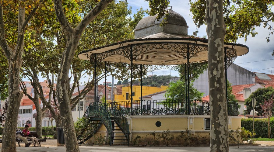 A gazebo in the middle of the park.
