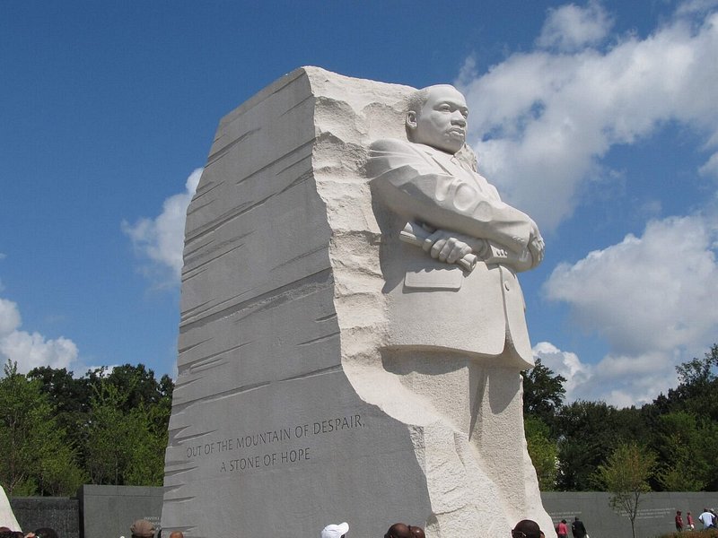 Stone sculpture of Martin Luther King Jr with "Out of the mountain of despair, a stone of hope" written on its side