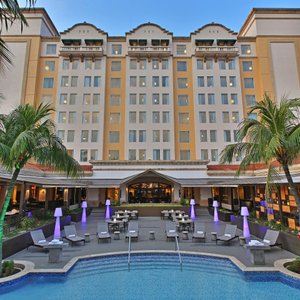 Hotel facade, terrace and pool area