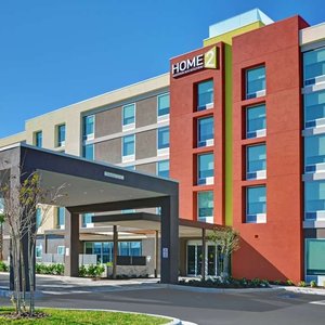 Home2 Suites by Hilton Largo in Largo, image may contain: Furniture, Interior Design, Bedroom, Bed