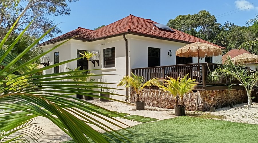 Exterior view and private entry for guest rooms three and four.