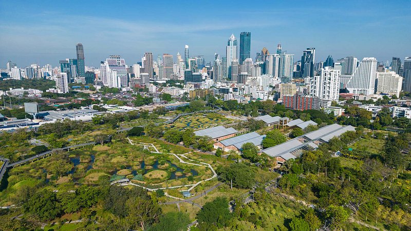 Aerial view of Benjakitti Park and Bangkok city skyline