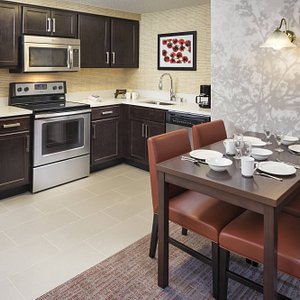 Two-Bedroom Suite with Fireplace Kitchen & Dining Area
