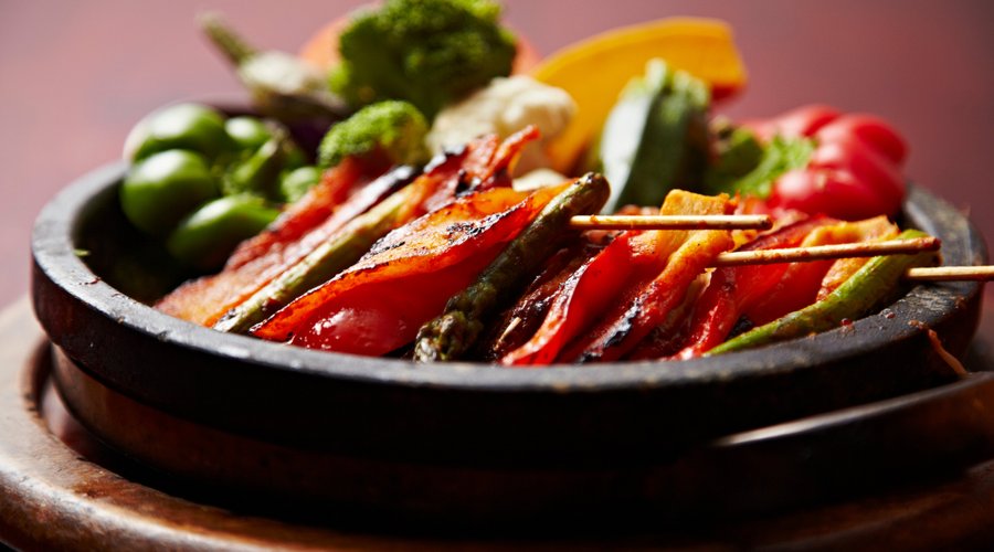 spicy grilled todok with asparagus on a stick