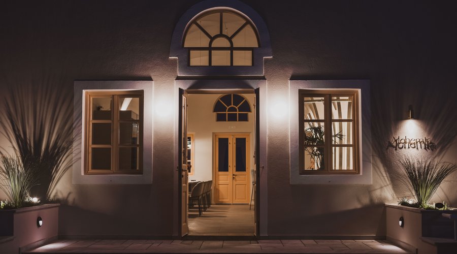 Welcome to Alchemia: Where Culinary Magic Begins!   Step into a world of enchantment at Alchemia's captivating entrance. Experience the perfect blend of elegance and warmth, setting the stage for a truly memorable dining experience. Join us and embark on a culinary journey like no other. 