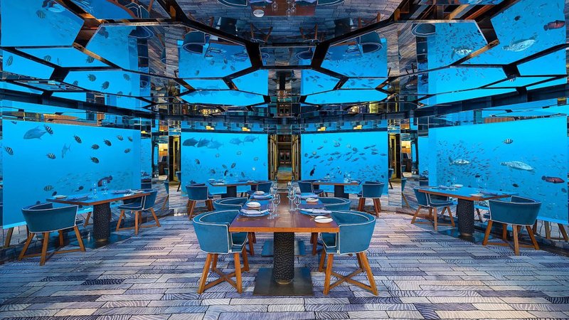 Underwater restaurant at Anantara Kihavah Maldives Villas