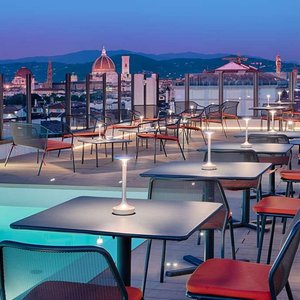NH Firenze in Florence, image may contain: Terrace, Chair, Pool, Cup