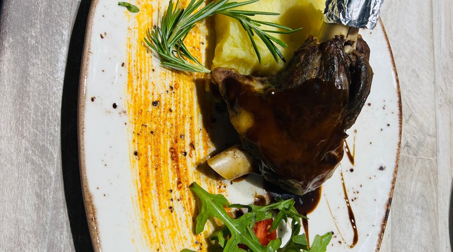Roasted Lamb shank with mashed potatoes.