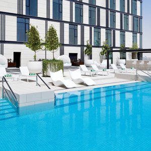 Soak up the sun at our Pool Bar & Lounge