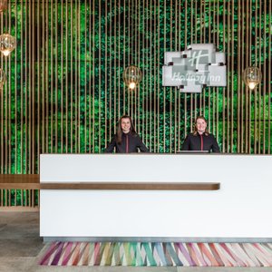 Friendly staff awaiting your check-in at the reception area.