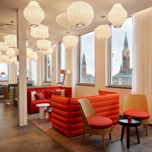 Part of the living room of citizenM Copenhagen Radhuspladsen