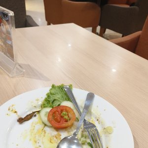 Orchardz Bandara in Tangerang, image may contain: Interior Design, Bed, Furniture, Cushion