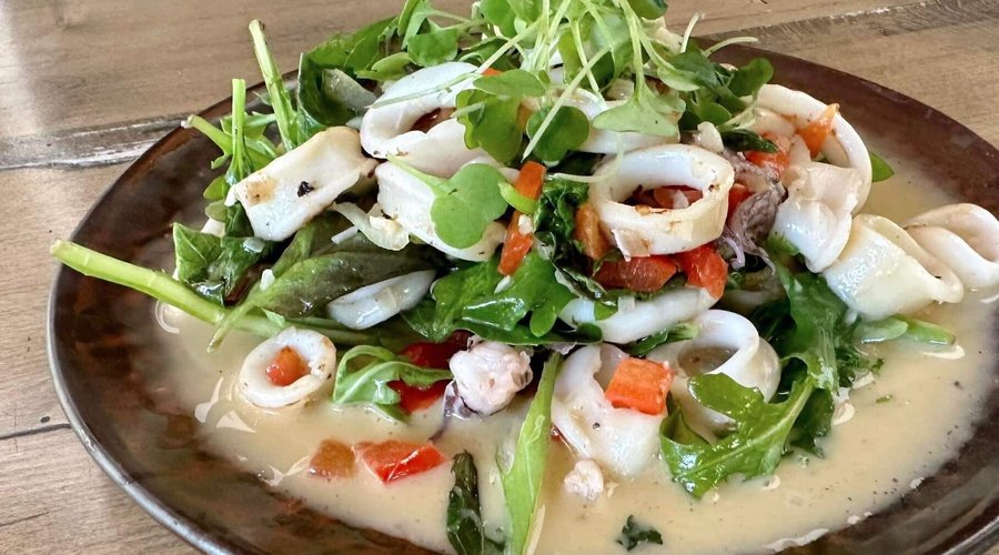 The Chump - Calamari Rings and Tentacles Sautéed with Garlic, White Wine, Fresh Basil & Red Bell Pepper with Jalapeño Confetti & Fresh Grated Reggiano Parmesan 