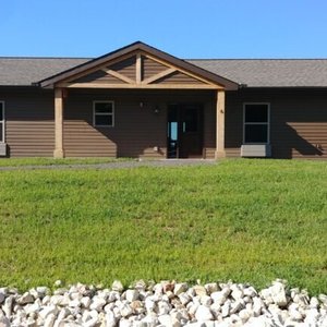 Outside photo of a Legacy Cabin with 4 bedrooms. 