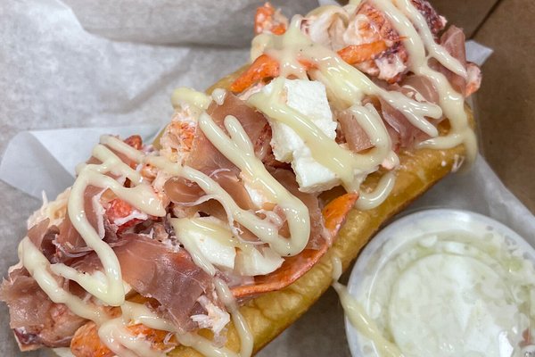 https://dynamic-media-cdn.tripadvisor.com/media/photo-o/29/65/8a/db/king-louis-lobster-roll.jpg?w=600&h=400&s=1