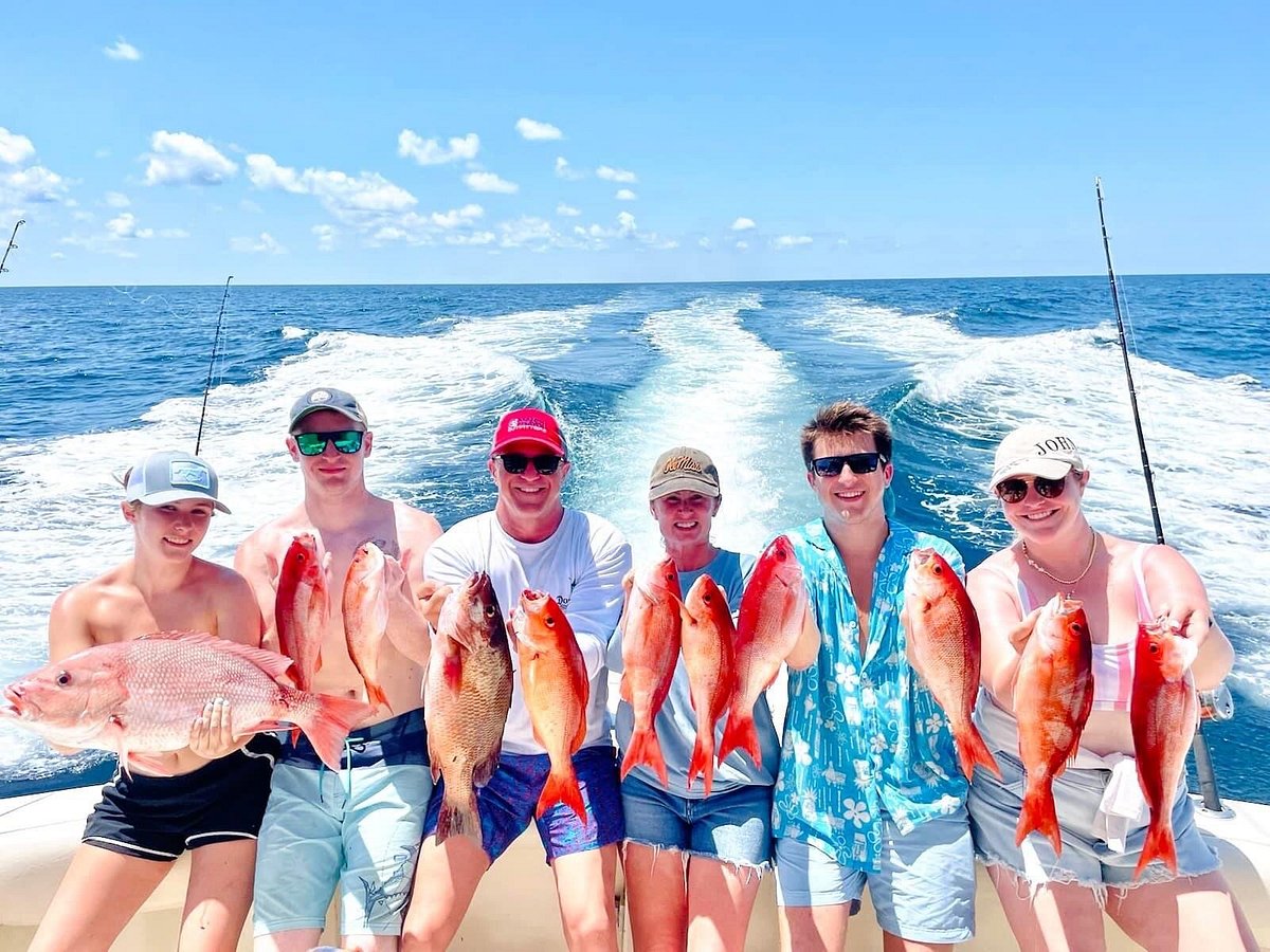 Thad and 13 year old boy with trigger fish - Picture of Getaway Charters,  Orange Beach - Tripadvisor