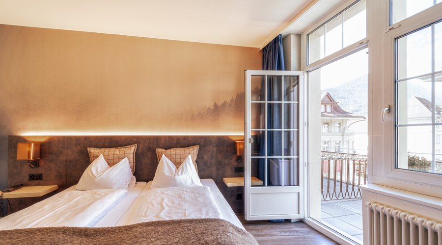 Double bedroom with balcony access in our 4* house
