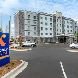 Comfort Suites Greenville Airport in Greenville, image may contain: Floor, Flooring, Lighting, Living Room