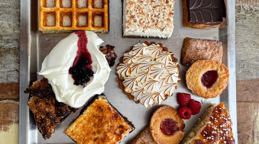 Fika med kakor, våffla och paj på Café Madame Blå Swedish fika with cakes, waffles and pies in Österlen