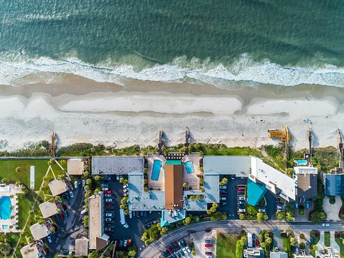 Why the Beach Is the Perfect Place to Keep Practicing Yoga - The Oceanfront  Litchfield Inn