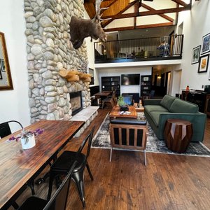 First floor lobby and gathering area, with fireplace and comfy seating areas