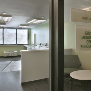 Complimentary washers and dryers, opened 24 hours