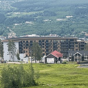 Summer pic Trysil Alpine Lodge located close for bike in and bike out and in winter ski in ski out.