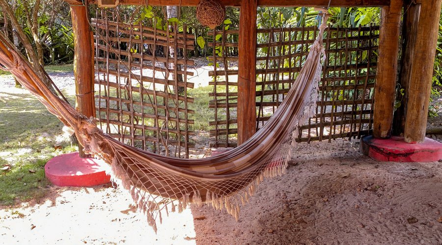 Varanda embaixo do Bangalô duplo com terraço. Área privada da suíte.
