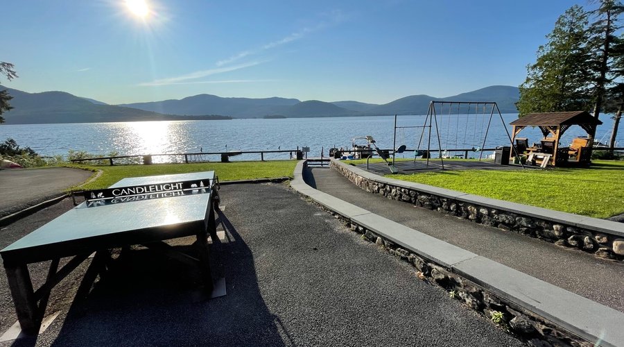 A beautiful summer morning! Play ping pong, relax on the swings or in the gazebo while enjoying gorgeous views of the lake.