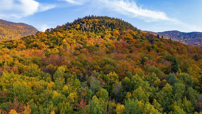 Aerial view of Mount Mansfield, Vermont during peak fall foliage