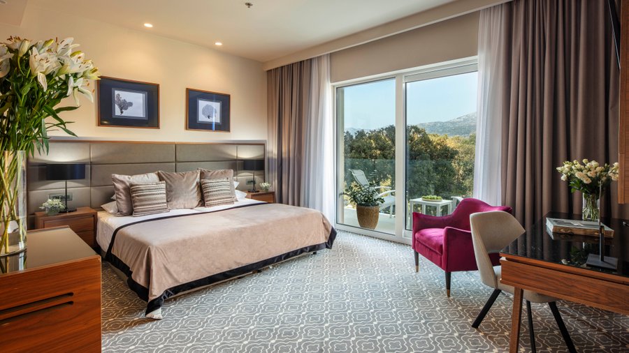 Luxury room with balcony in Royal hotel Ariston.