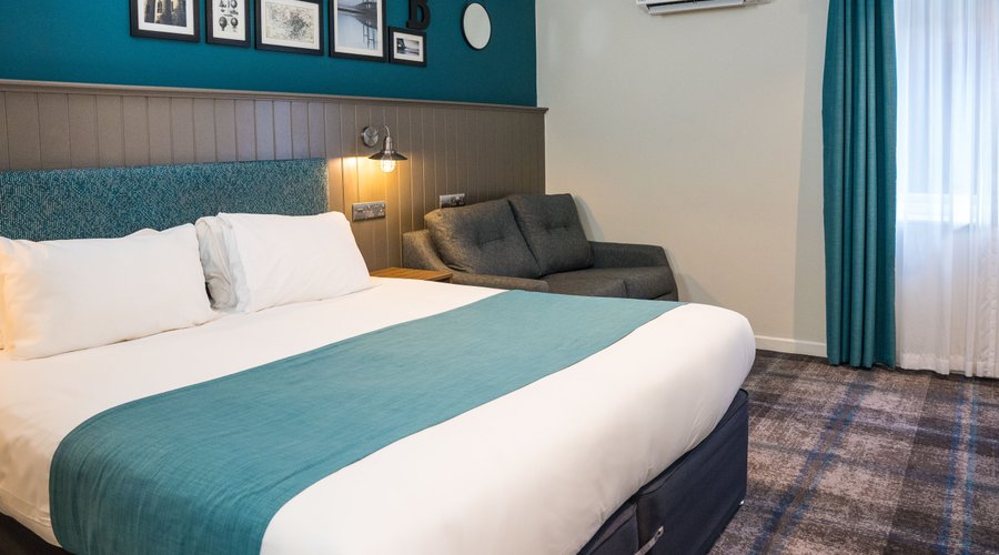 Deluxe King with Sofa bed.