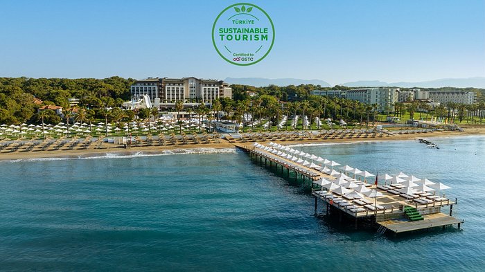 Discover pure paradise in our aerial snapshot: Behold the elegance of our main hotel building, the embrace of Sorgun Forest, the allure of beachfront luxury, and the warmth of our family jetty. Experience the ultimate escape at its finest.