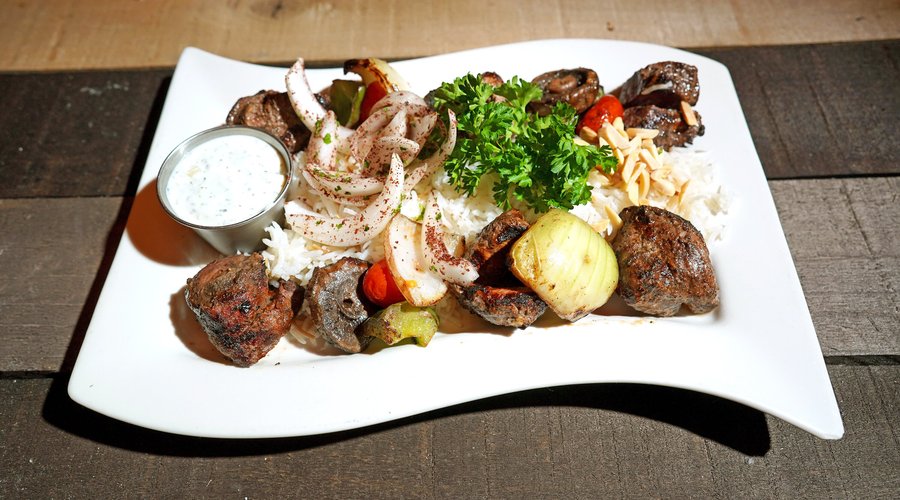 Savor the succulent Lahm Mechwi, a taste of heaven. Indulge in the best lamb in DC tonight!