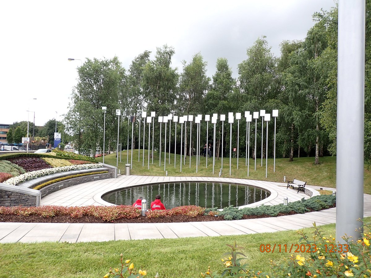 The circular contemplative Omagh Bomb Memorial Garden with water features and plaques, located in Omagh, Northern Ireland.
