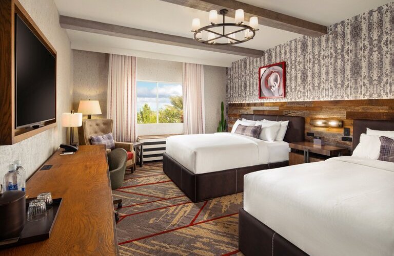 Rustic Modern guest room.  Get cozy in our rustic modern haven – where cowboy boots meet plush slippers and comfort meets style! 