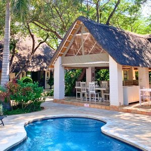 Outdoor pool and gazebo eating area