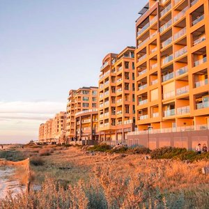 Exterior view of property from beach
