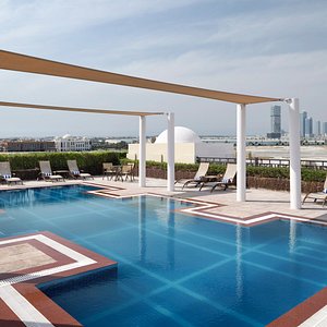 Movenpick Hotel Apartments Al Mamzar Dubai in Dubai, image may contain: Condo, City, Office Building, Urban