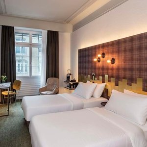 NH Bern The Bristol Room superior curtains open twin king size bed view tv