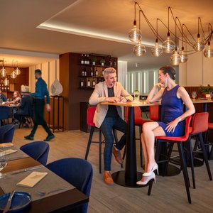 Hotel Duo in Prague, image may contain: Living Room, Screen, Monitor, Couch