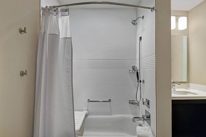 Very handy shelves in the shower / bath tub. - Picture of Towneplace Suites  By Marriott Sudbury - Tripadvisor