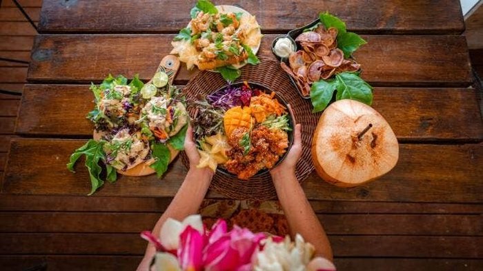 we are a small family business bringing our guests local flavors prepared in a modern way our dining spaces are casual, rustic and welcoming, as our customers have mentioned it’s kinda like stepping into our living room there are pieces of our journey here 