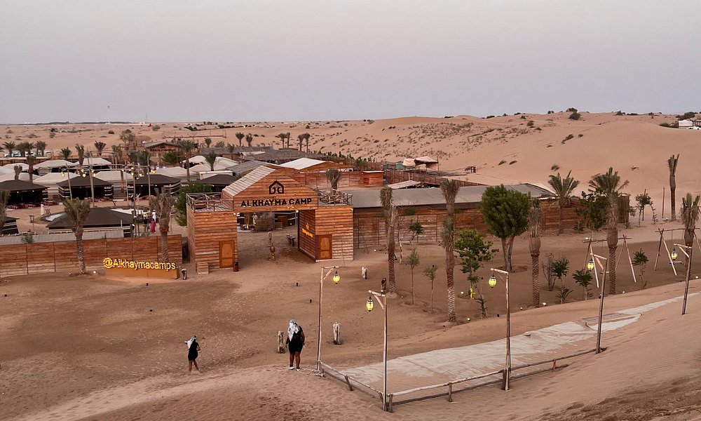 Dunas Vermelhas de quadriciclo, sandboard, passeio de camelo e churrasco em um acampamento Al Khayma