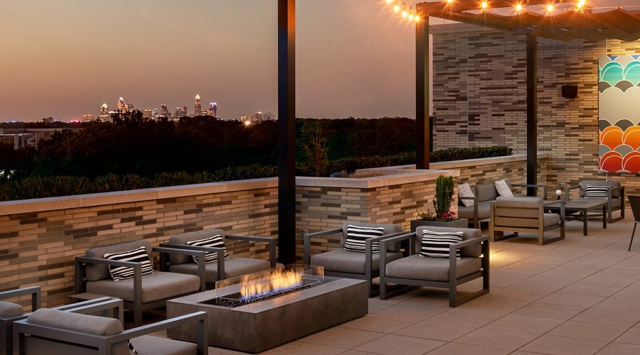 Enjoy breathtaking views of Charlotte from our Cordial Rooftop Bar and Lounge