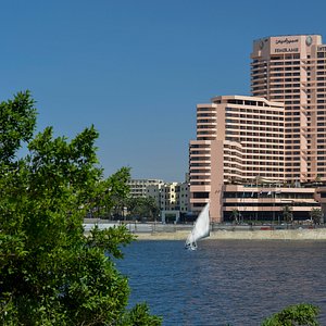 Hotel exterior overlooking the Nile by day