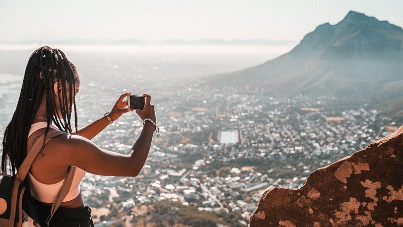 Woman photographing Cape Town, South Africa