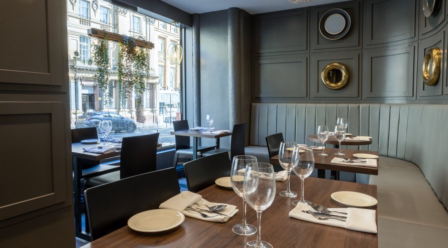 Admiring the scenic and historically rich Grey Street, while seated inside Ayla restaurant.