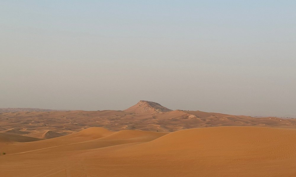 Recorrido por las dunas rojas en quad, Sandboarding, paseo en camello y barbacoa en el campamento Al Khayma